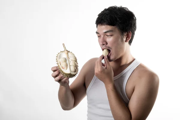 Asian man eating Durian — Stock Photo, Image
