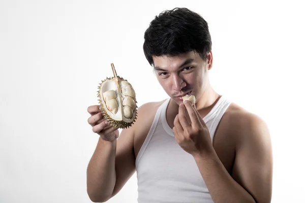 Asian man eating Durian — Stock Photo, Image