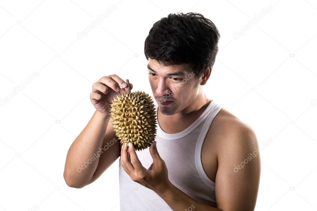 Asian man with bad smell of durian in white background