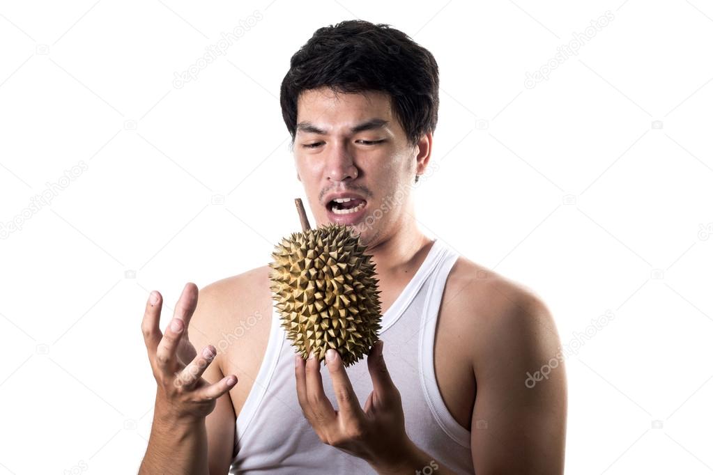Asian man with bad smell of durian in white background
