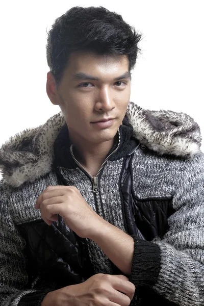 Asian man in fur and yarn texture jacket — Stock Photo, Image