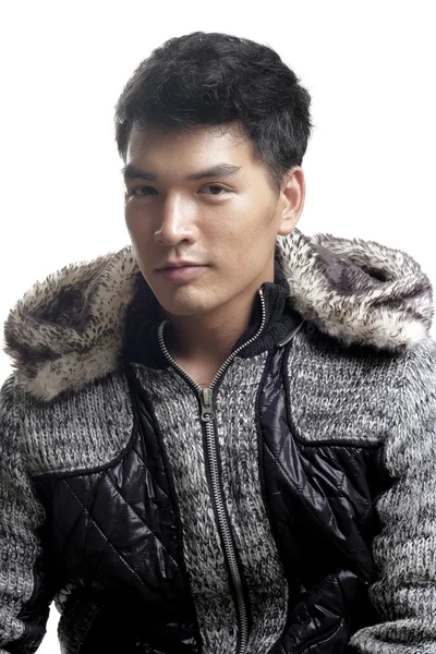 Asian man in fur and yarn texture jacket — Stock Photo, Image