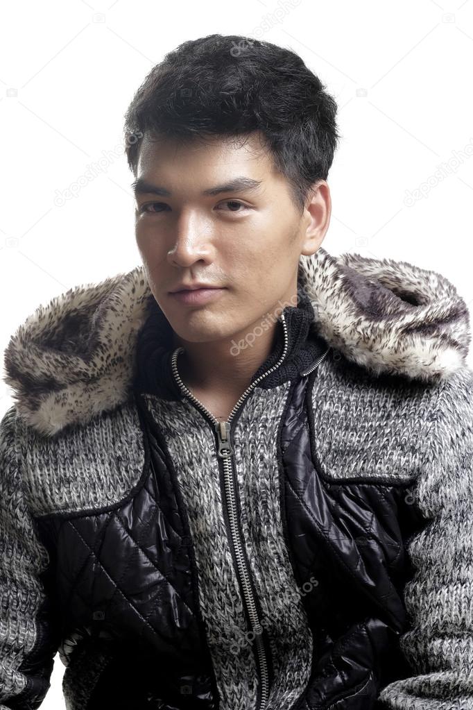 Asian man in fur and yarn texture jacket