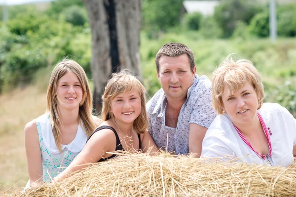 Happy family on nature — Stock Photo, Image