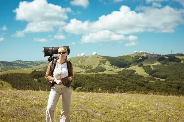 Young woman hiking smiling happy portrait.