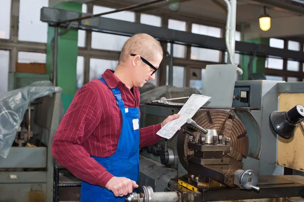 Man works for Production Machine — Stock Photo, Image