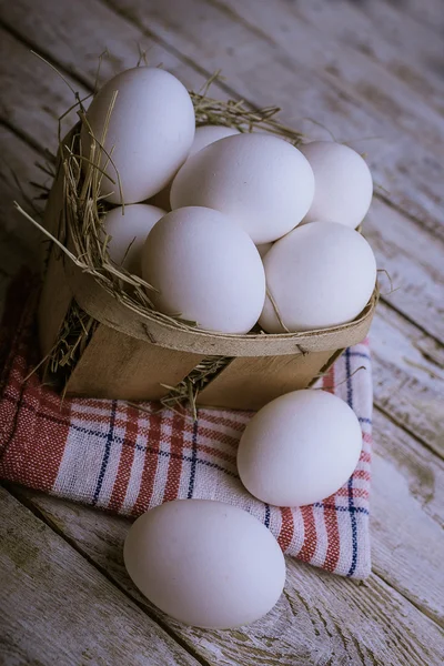 Chicken eggs in the basket — Stock Photo, Image