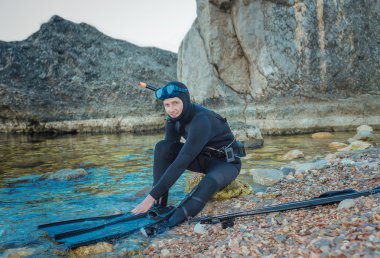 Man in a suit underwater hunter,