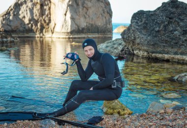 Man in a suit underwater hunter,