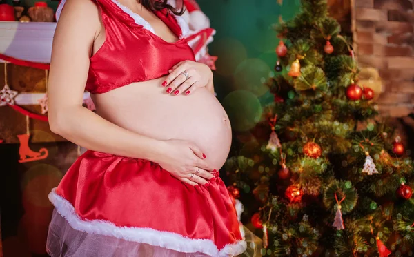 Christmas holiday. Pregnant woman — Stock Photo, Image