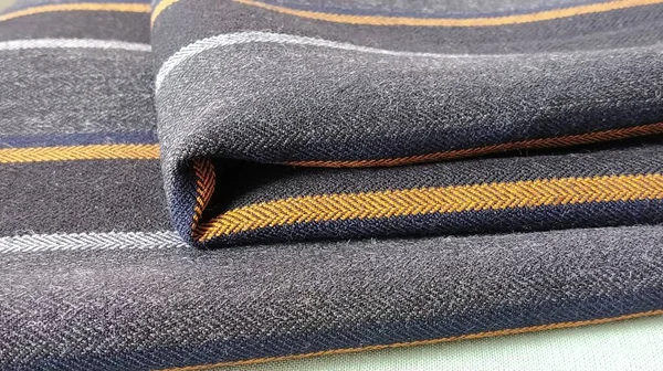 Light Green Black Gray Folded Fabric Orange Dark Blue Stripes — Stock Photo, Image
