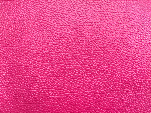 亮粉色人造皮革的特写 皮革质感的背景 明亮的深红色背景 — 图库照片