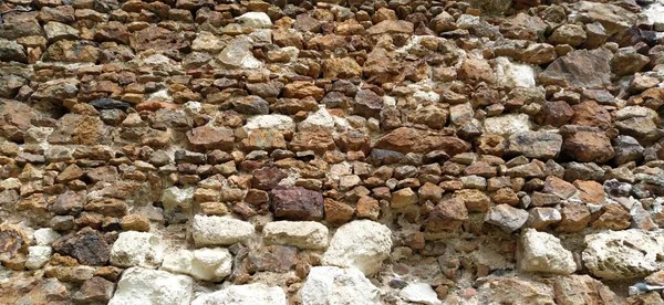Stone Wall Stacked Large Bricks Cobblestones Warm Colors Loose White — Stock Photo, Image