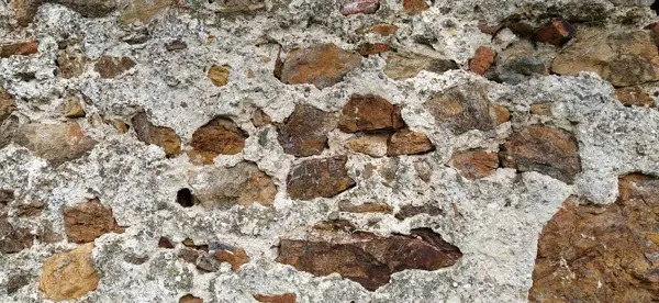Stenen Muur Grote Bakstenen Kasseien Gestapeld Warme Kleuren Losse Witte — Stockfoto