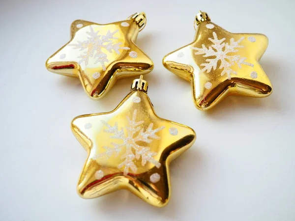 Christmas Toys Gold Stars White Background Beautiful Christmas Decorations — Stock Photo, Image