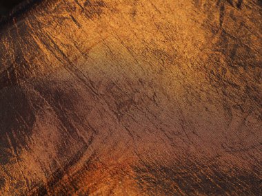 Güzel kumaş - tafta, nazikçe katlanmış dalgalar. İpek ya da ipeğe benzeyen buruşuk bir madde. Farklı ışıklandırma açılarında taşma ve renk değişimi. Elbise ve perde dikmek için kumaş