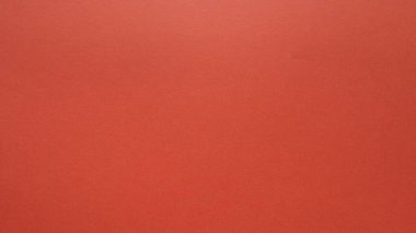 Red simple Christmas background. Bright vivid kind of red