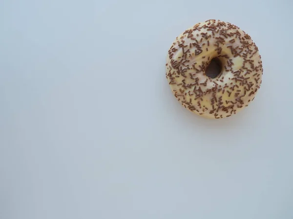 Doughnut Close Blue Background Delicious Cake Covered Vanilla Icing Chocolate — Stock Photo, Image