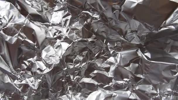 Фольга Крупным Планом Алюминиевая Серебряная Смятая Фольга Абстрактный Металлический Фон — стоковое видео