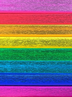 Gilbert Baker 'ın Gurur Bayrağı. Genel LGBTQ LGBTİ topluluğunun sembolü. Krep kağıdı pembe, kırmızı, turuncu, sarı, krep, mavi, mor ve mor renkte mevcuttur. Gurur olayları için renkli arkaplan