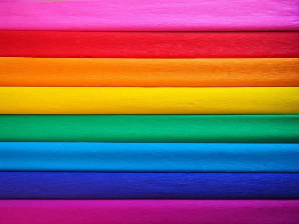 Pride Flag av Gilbert Baker. Symbol för hela hbtq-gruppen. Crepe papper finns i rosa, rött, orange, gult, crepe, blått, lila och magenta. Färgstark bakgrund för Pride händelser — Stockfoto