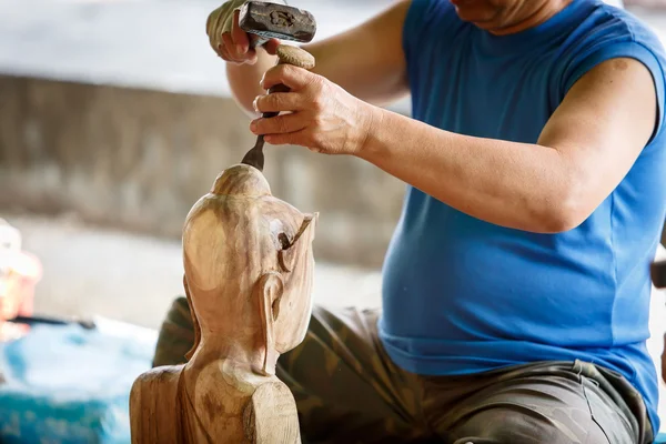 Hand van houtsnijwerk — Stockfoto