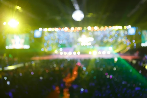 Silhouette concert in front of stage blurred — Stock Photo, Image