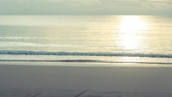 Sea wave on the beach with sunlight in morning — Stock Photo, Image