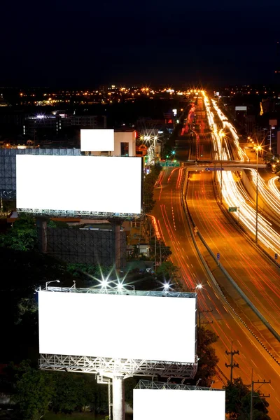 Night city traffic and billboards — Stock Photo, Image