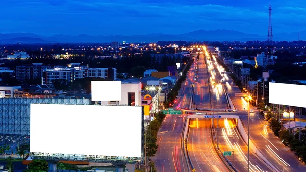 Night city traffic and billboards — Stock Photo, Image