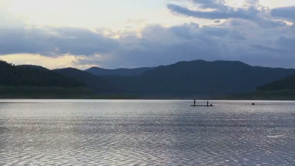 Fisherman fishing on the boat — Stock Video