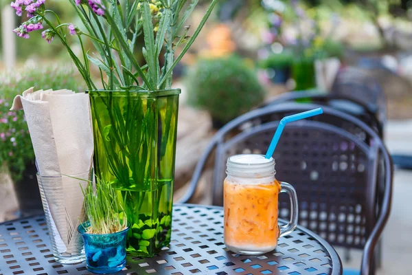 Ice tea latte on table in cafe — Stock Photo, Image