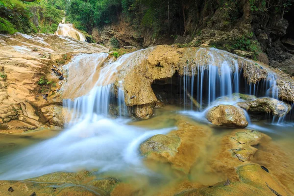 Wonderful waterfall with colorful tree in thailand — Stock Photo, Image