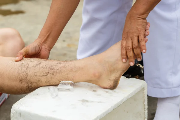 First aid for cramp injury — Stock Image First aid for cramp injury Royalty Free Stock Images