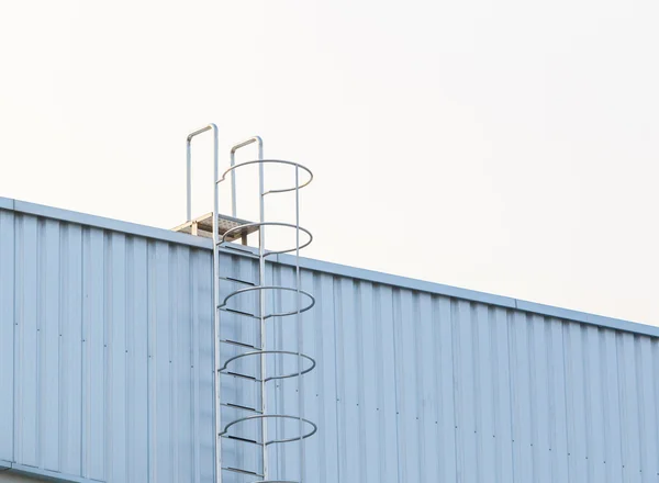 Factory ladder on the roof — Stock Photo, Image