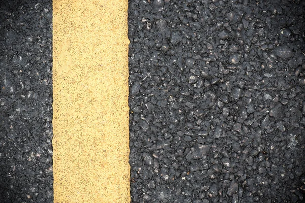 Línea amarilla en la textura del camino — Foto de Stock