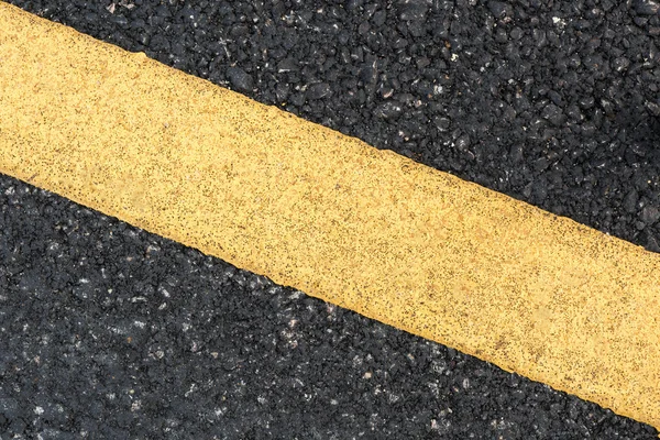 Žlutá čára na silnici textury — Stock fotografie