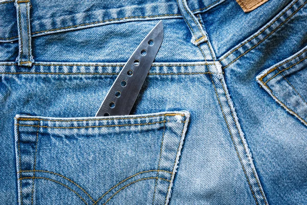 Bolsa de jeans con cuchillo —  Fotos de Stock