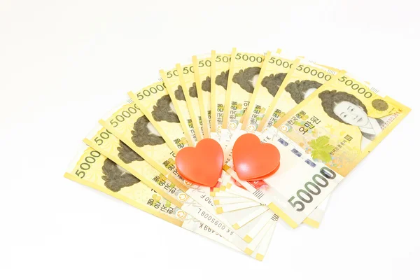 Korea money with twin heart on white — Stock Photo, Image