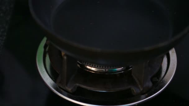 Pan on a gas stove — Stock Video