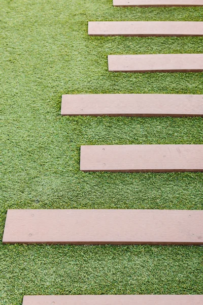 Staircase artificial grass with wooden planks — Stock Photo, Image