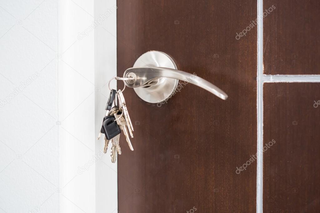Keys in keyhole in door