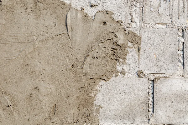 Plasterer concrete on wall of house construction — Stock Photo, Image