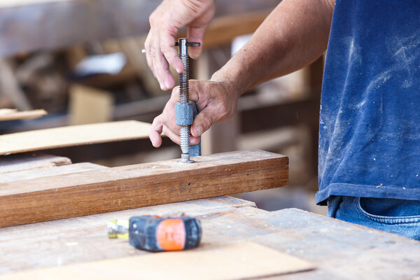 Carpenter use saw cut wood