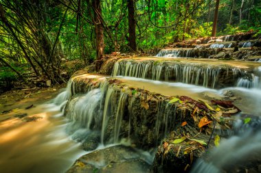 Wonderful waterfall in thailand clipart