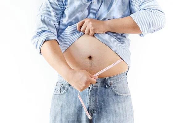 Hombre gordo midiendo su cintura — Foto de Stock