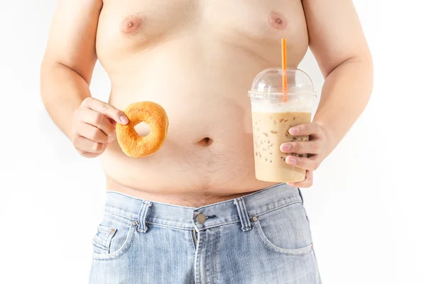 Tlustý muž s kobliha a káva — Stock fotografie
