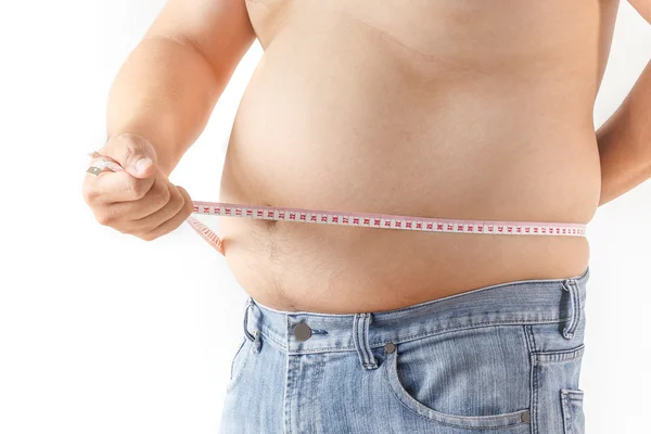 Gordo medindo sua cintura — Fotografia de Stock