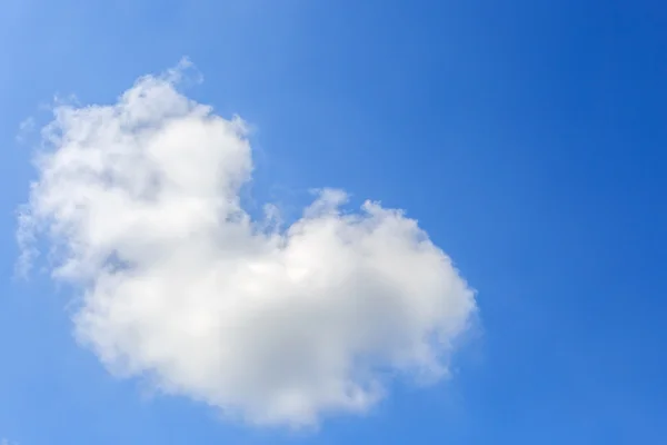 Heart clouds on the blue sky