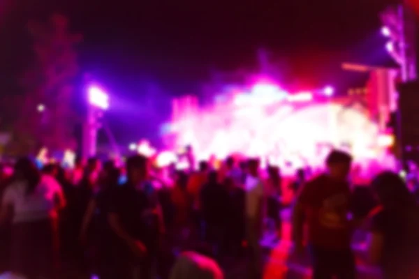 Silhouette crowd in front of concert stage — Stock Photo, Image